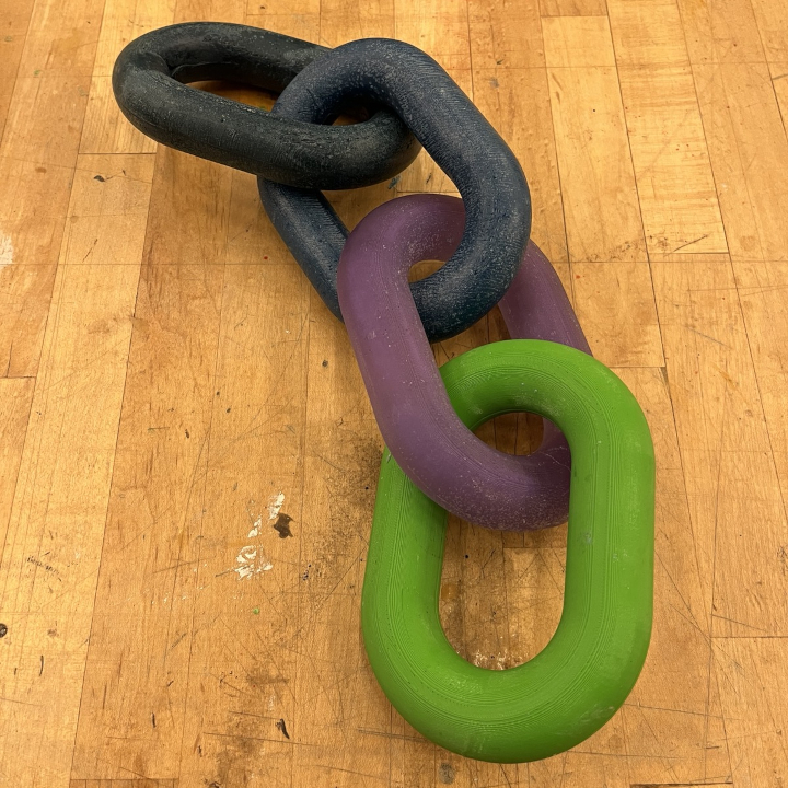 <i>Untitled</i>. An image of four cast chainlinks.