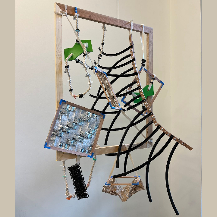 <i>Dimensionality</i>. A piece exploring unexpected dimensions for various materials---such as using canvas one-dimensionally, and using pipes two-dimensionally.