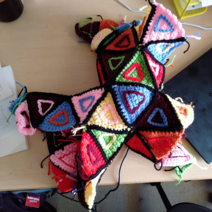 Rare image of the crocheted Klein quartic still under construction