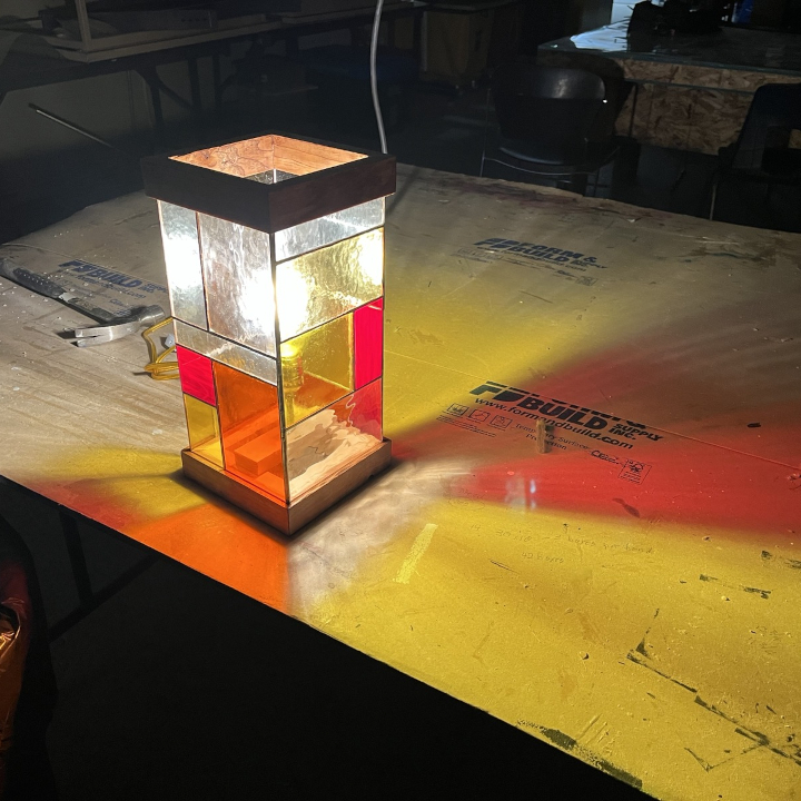 <i>Untitled</i>. An image of a stained-glass desk lamp.