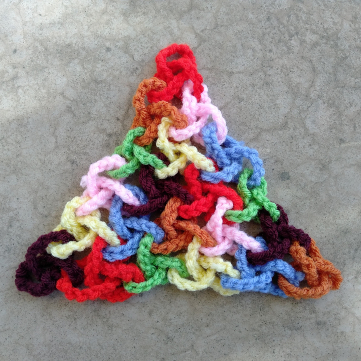 Carpet of trefoil knots linked together